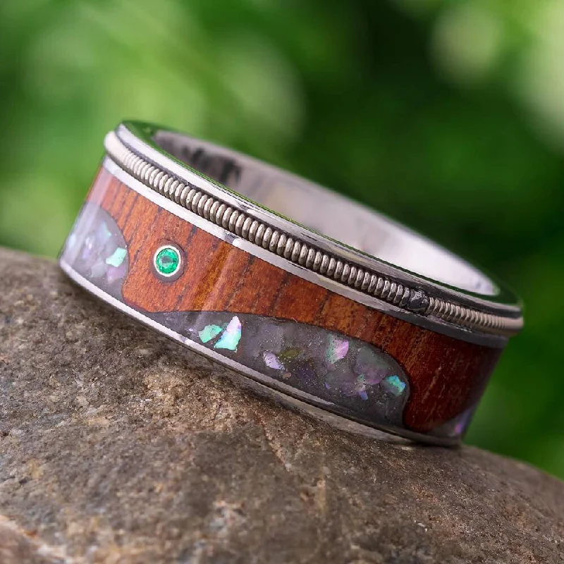 Guitar String Wedding Band with Abalone Wave Design and Emerald Stone