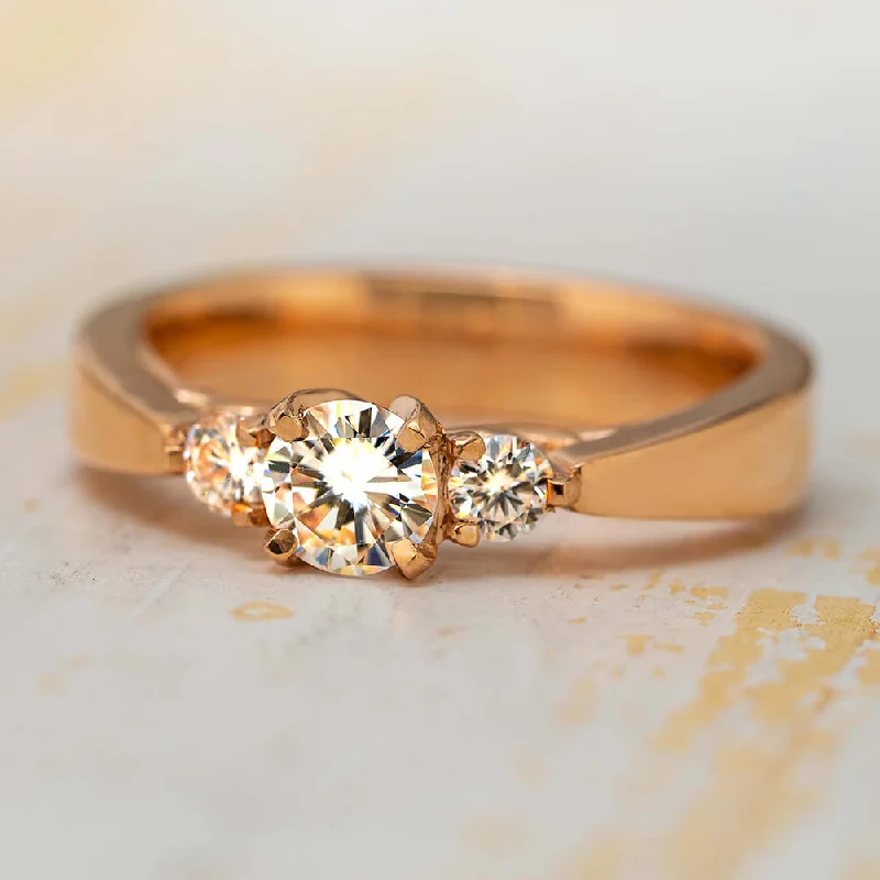 Three Stone Engagement With Floral Prongs